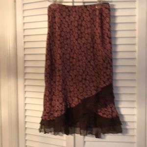 Skirt with stunning detail on hemline.